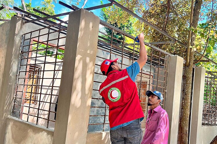 Volunteer working on shelter
