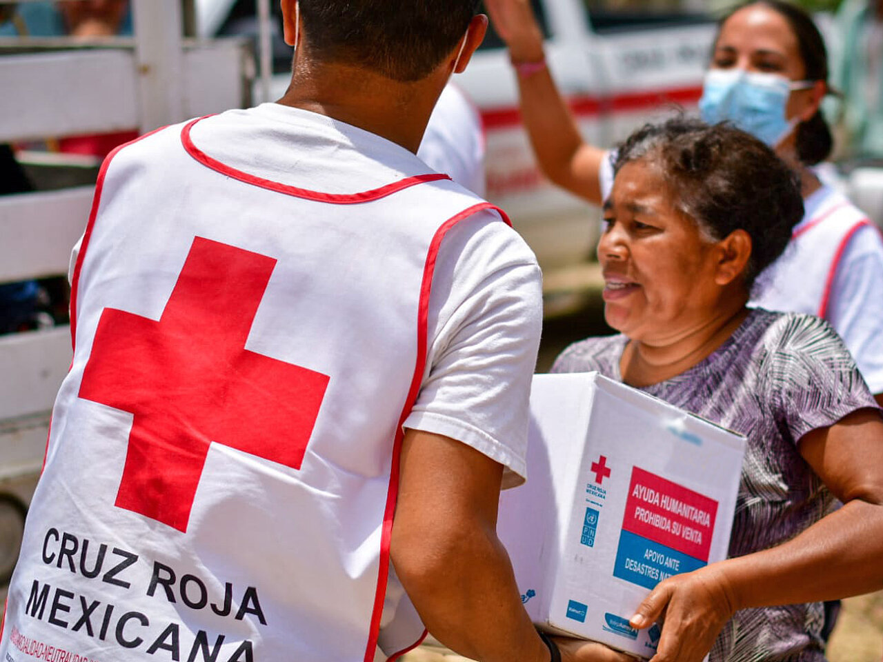 Senior woman receiving a box