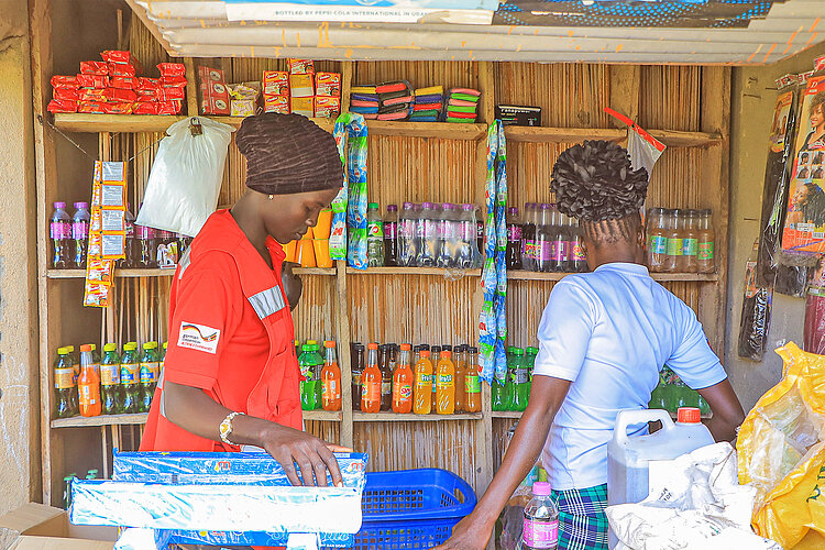 Two women in a kiosk